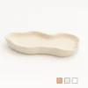 Schale Wellendesign in Beige aus Keramik Design auf weißem Hintergrund